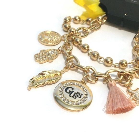 3/$29! GUESS Charm Bracelet Tassel, Elephant, Leaf - Picture 4 of 7